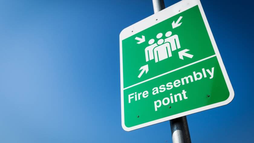 Green fire assembly point sign in Coventry