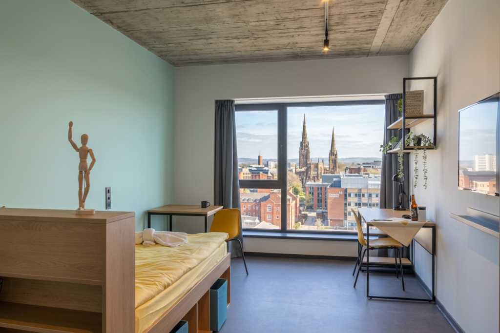 Student dorm room with view of Coventry cathedral